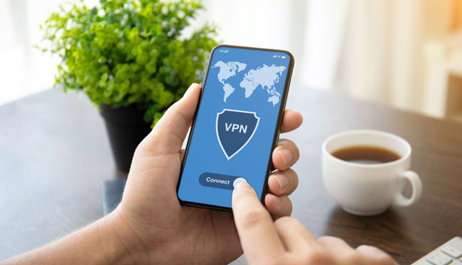 man hands holding phone with app vpn